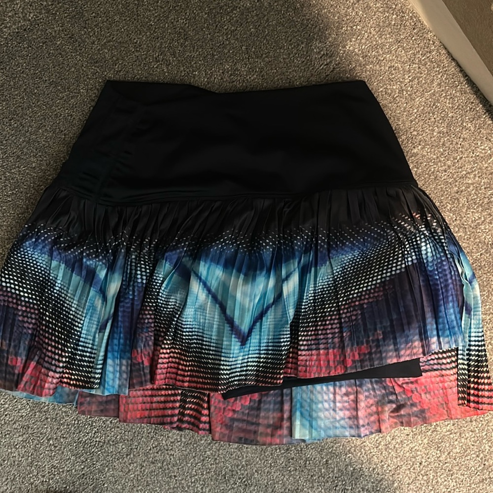 Lucky in love tennis skirt, worn once, vibrant colors